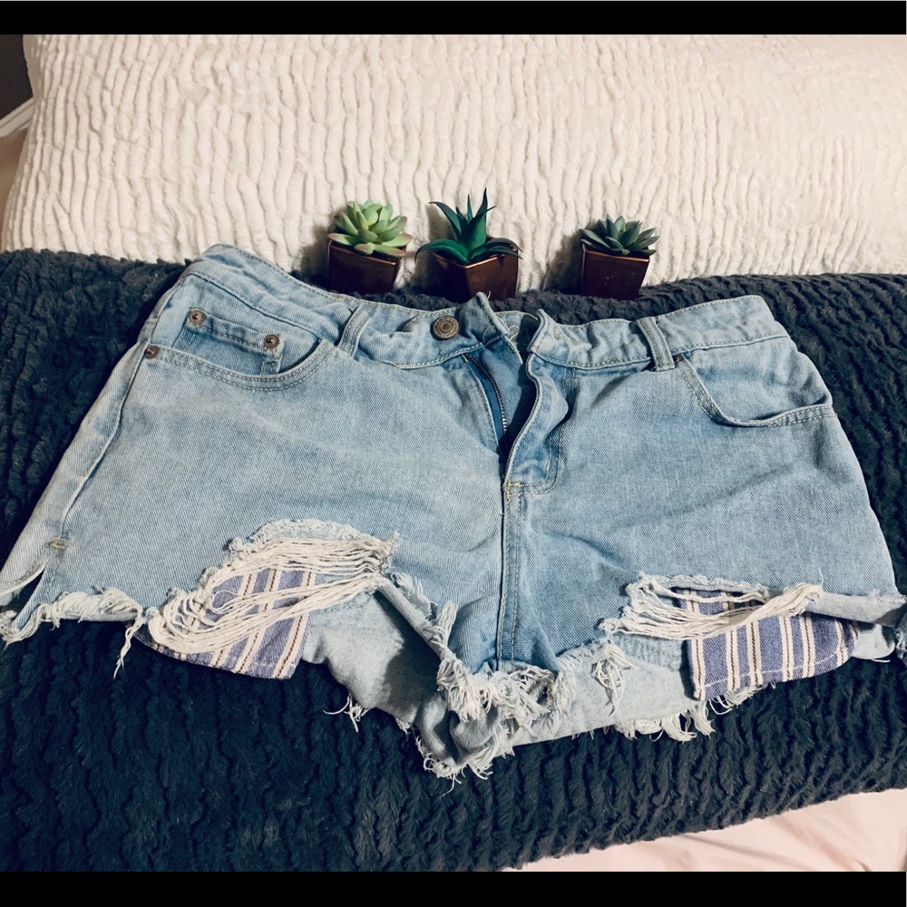 Size 8 Rue21 denim jeans with striped pockets